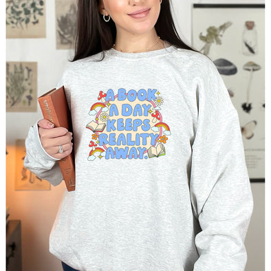 A Book A Day Keeps Reality Away Crewneck Sweatshirt--Painted Lavender